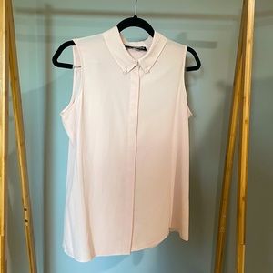 Dressy button up tank, perfect for work, with pearl details at the collar!